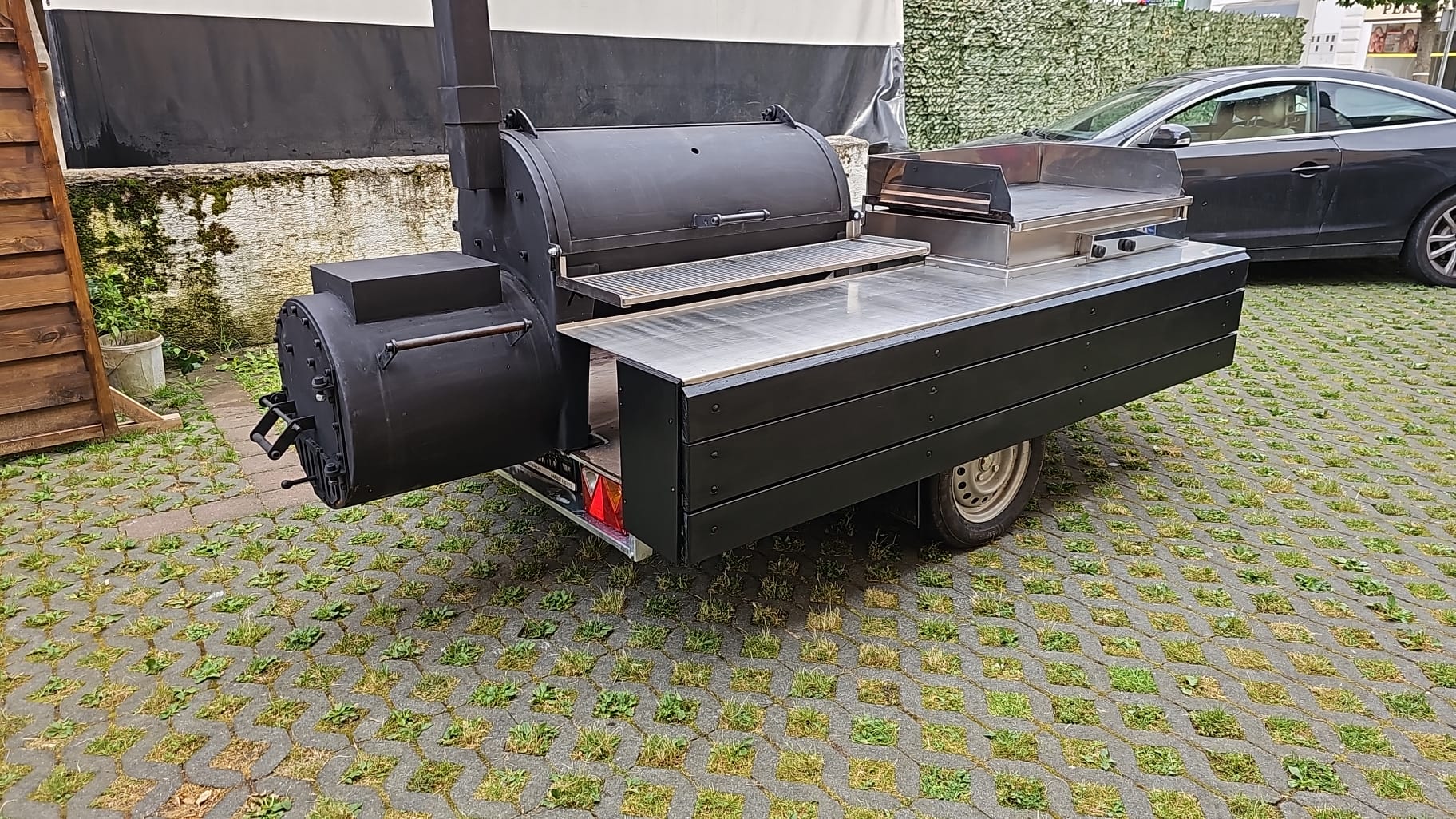 Barbecue smoker with crisp ribs and briskets.